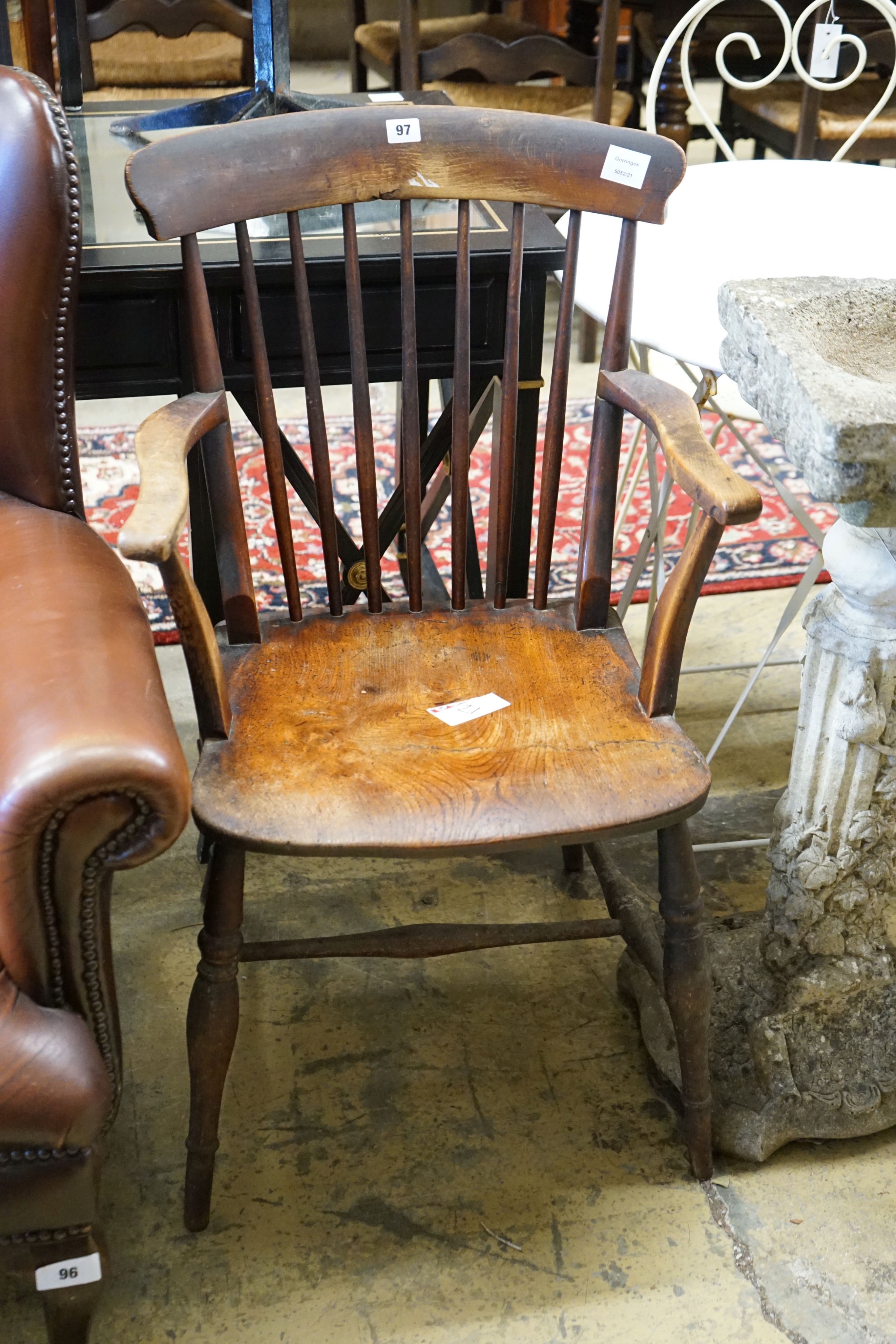 A Victorian elm and beech Windsor comb back elbow chair, width 53cm, depth 42cm, height 93cm